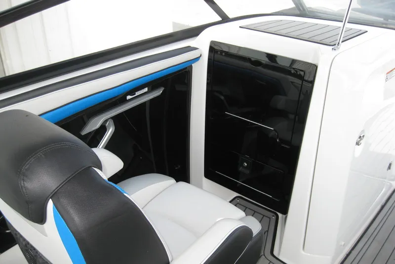 Slide: The Image of Interior of 2018 Yamaha Boats 242X E-Series, featuring sleek seating and modern design. - 14