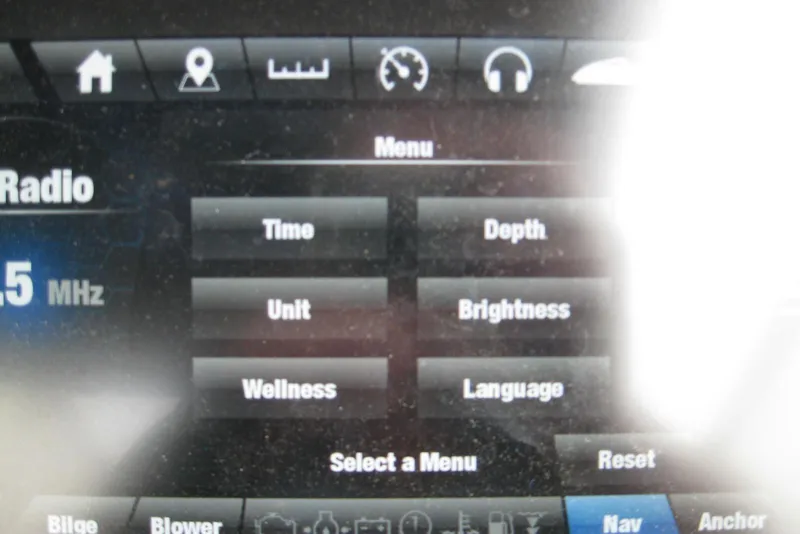 Slide: The Image of Yamaha Boats 2018 242X E-Series dashboard menu with radio and settings options. - 23