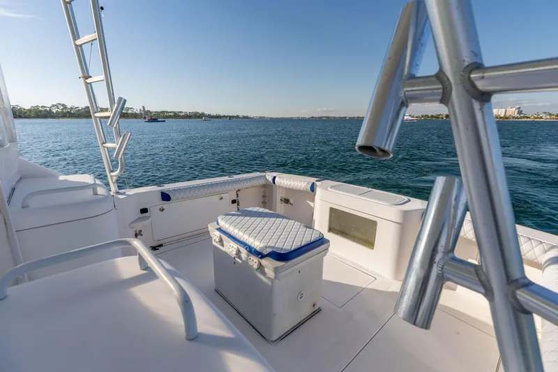 Slide: The Image of Cabo 35 Express 2000 boat deck with ocean view and seating area. - 26