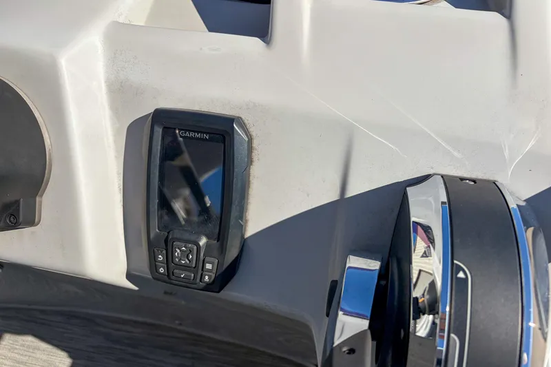 Slide: The Image of Garmin device on 2021 Bennington 188 SV boat dashboard, close-up view. - 14