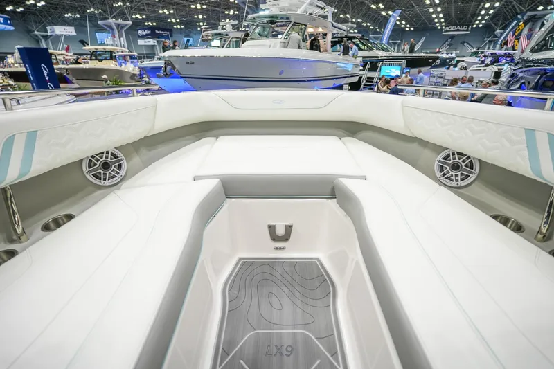 Slide: The Image of Luxurious interior of 2026 Regal LX9 boat at a boat show. - 15