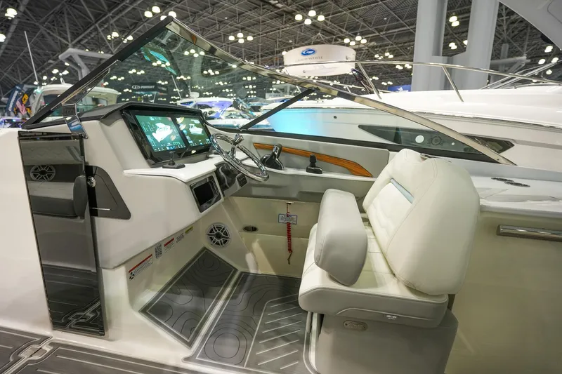 Slide: The Image of 2026 Regal LX9 boat interior with modern dashboard and luxurious seating. - 8