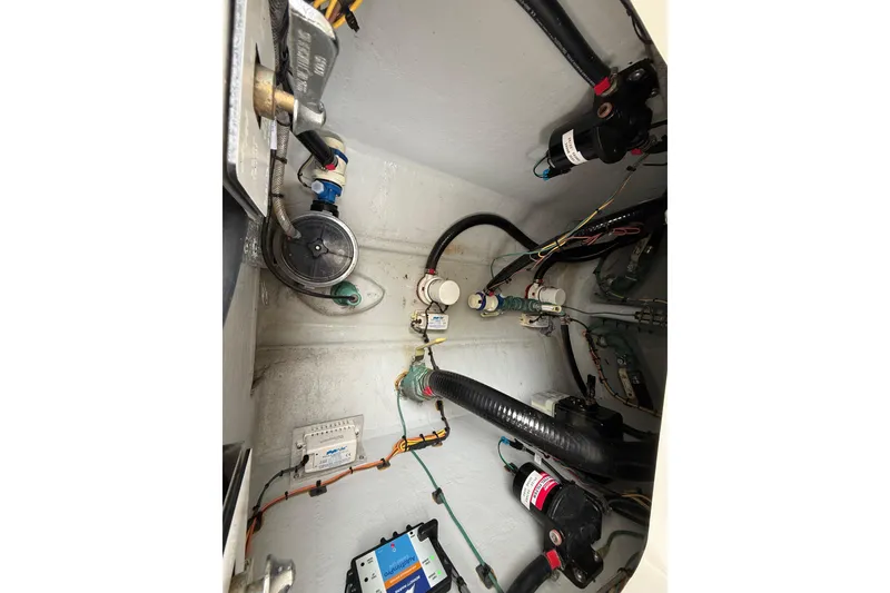 Slide: The Image of 2020 SeaVee 290B boat interior wiring and components view. - 26
