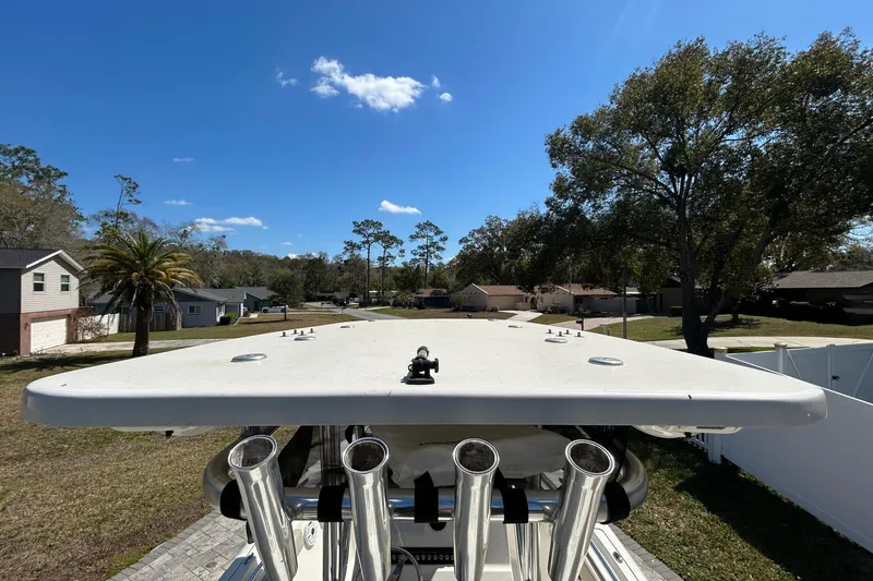 Slide: The Image of Key West 219 FS boat from 2022 with blue sky. - 23