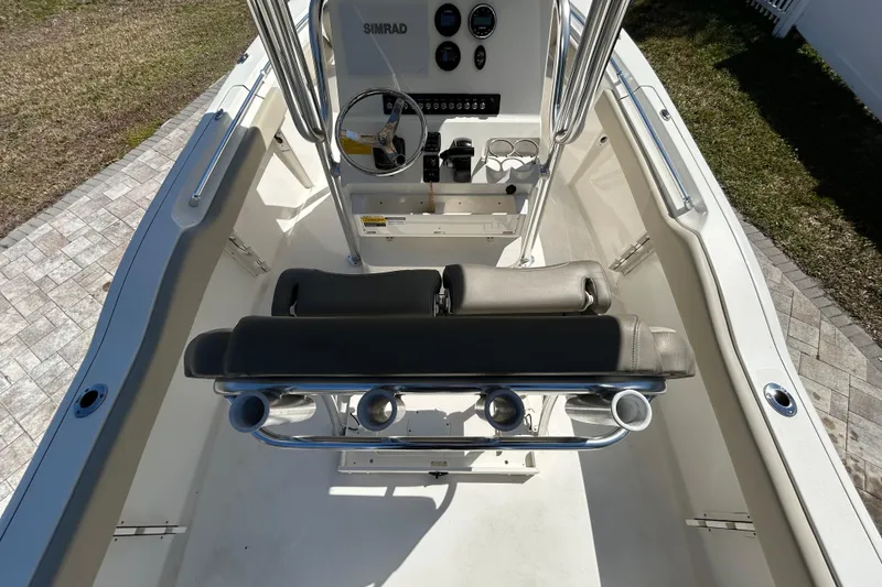 Slide: The Image of 2022 Key West 219 FS boat interior with steering console and seating. - 24