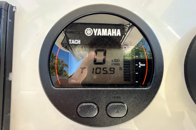 Slide: The Image of Yamaha tachometer on 2022 Key West 219 FS boat, displaying 105.9 hours. - 29