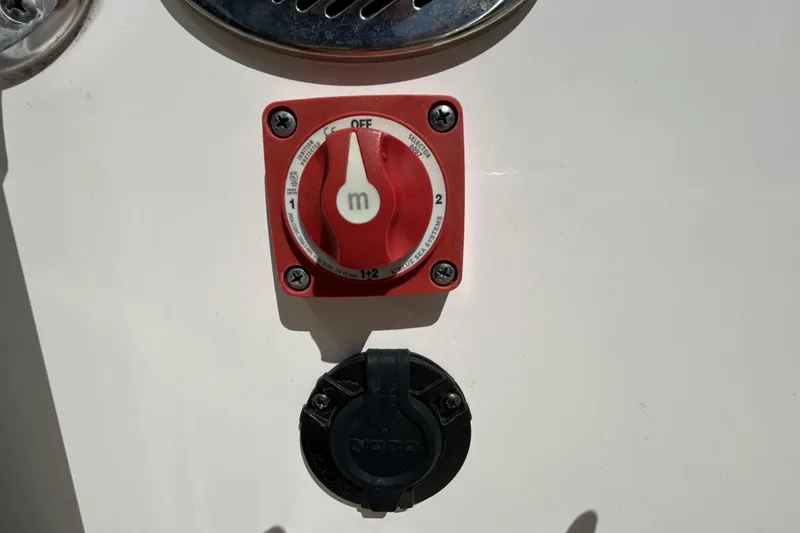 Slide: The Image of Red battery switch on 2022 Key West 219 FS boat. - 30