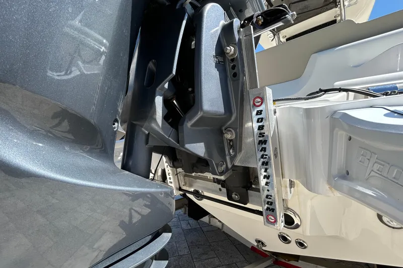 Slide: The Image of 2022 Key West 219 FS boat engine and transom detail with Bob's Machine components. - 4