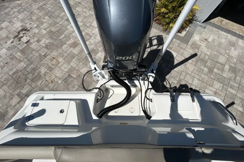 Slide: The Image of 2022 Key West 219 FS boat with Yamaha 200 engine, viewed from above. - 54