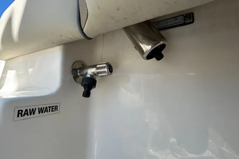Slide: The Image of 2022 Key West 219 FS boat raw water outlet detail. - 73