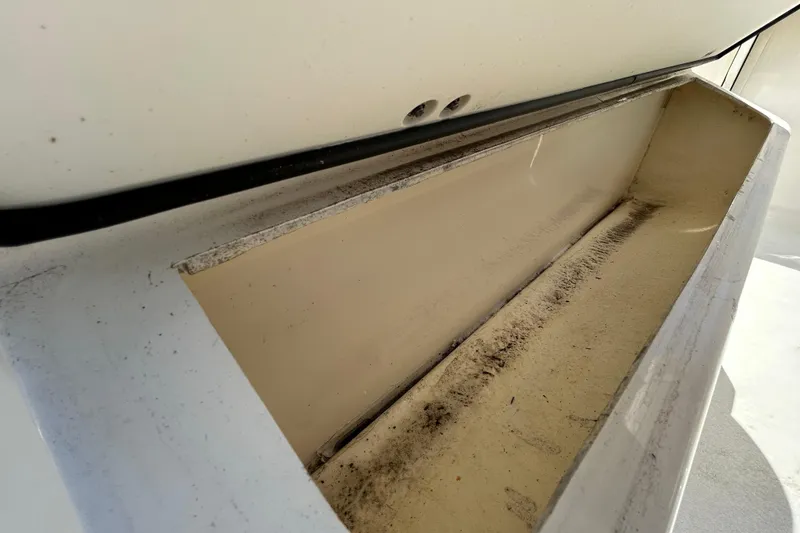 Slide: The Image of Storage compartment of 2022 Key West 219 FS boat, showing interior details. - 78