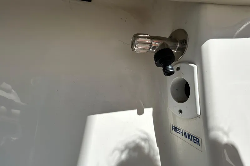 Slide: The Image of Fresh water outlet on 2022 Key West 219 FS boat. - 94