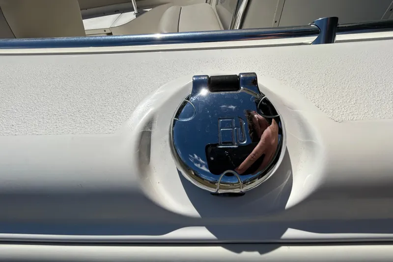 Slide: The Image of Chrome fuel cap on 2022 Key West 219 FS boat deck. - 95