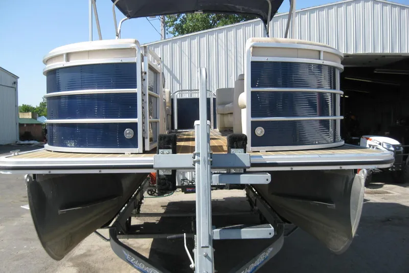 Slide: The Image of 2016 Harris FloteBote 200 Cruiser CX pontoon boat on trailer, rear view. - 3