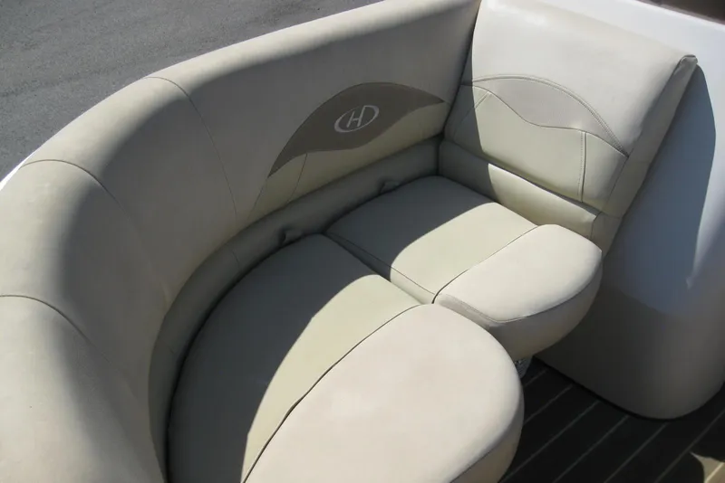 Slide: The Image of 2016 Harris FloteBote 200 Cruiser CX, beige cushioned seating detail. - 7