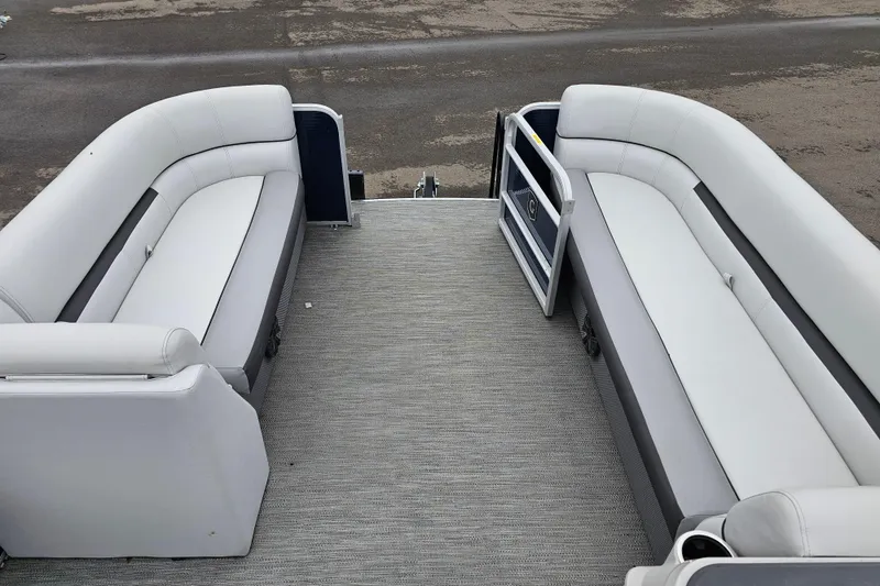 Slide: The Image of 2022 Sweetwater 2286 SFL pontoon boat interior with spacious seating and modern design. - 16