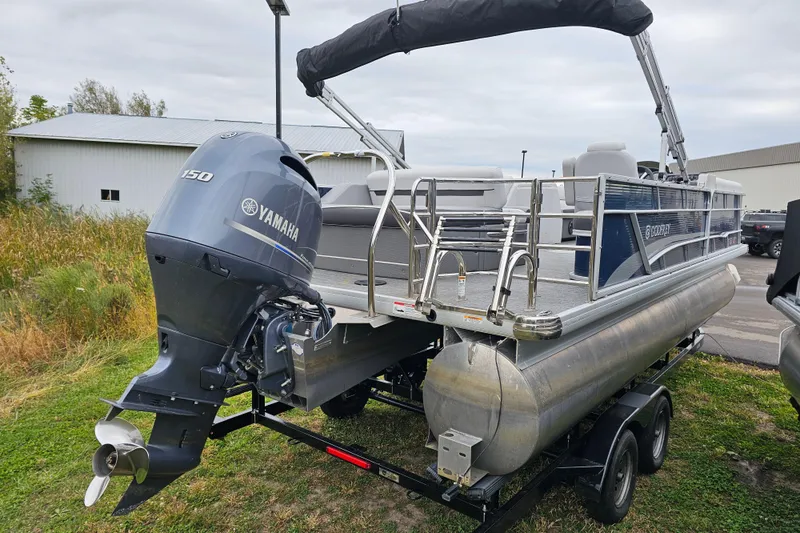 Slide: The Image of 2022 Sweetwater 2286 SFL pontoon boat with Yamaha 150 engine on trailer. - 4