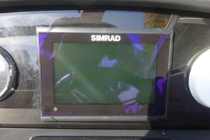 Slide: The Image of Simrad display on 2024 Four Winns H1 OB boat dashboard. - 14