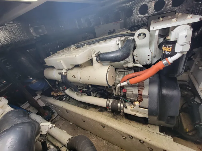 Slide: The Image of Engine compartment of a 2006 Carolina Classic 32 Express boat. - 17