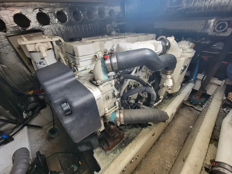 Slide: The Image of Engine compartment of a 2006 Carolina Classic 32 Express boat. - 19