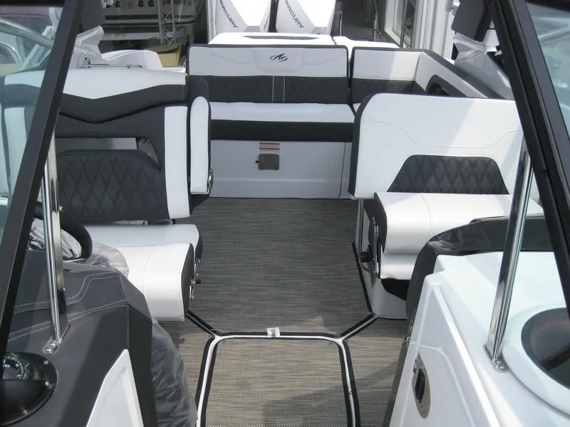 Slide: The Image of 2024 Monterey 305 SS boat interior with luxurious seating and modern design. - 22