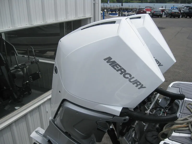 Slide: The Image of 2024 Monterey 305 SS with dual Mercury outboard engines. - 6