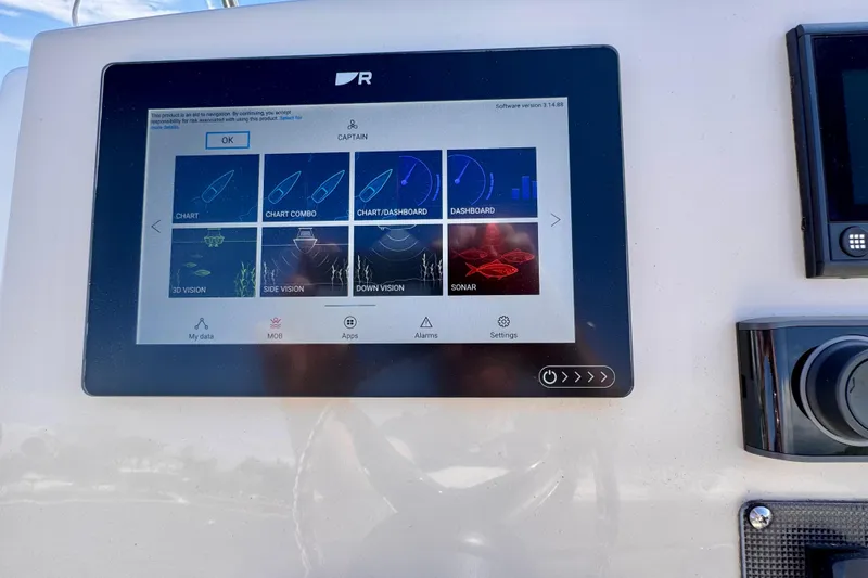 Slide: The Image of Touchscreen navigation display on 2022 Boston Whaler 220 Dauntless boat dashboard. - 4