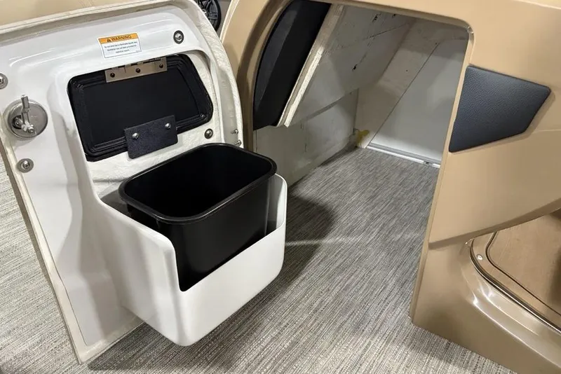 Slide: The Image of Interior of 2026 Godfrey Monaco 235 SFL with built-in trash compartment. - 12