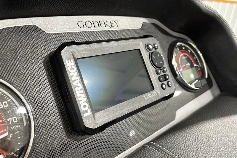 Slide: The Image of Dashboard of 2026 Godfrey Monaco 235 SFL with Lowrance display and gauges. - 16