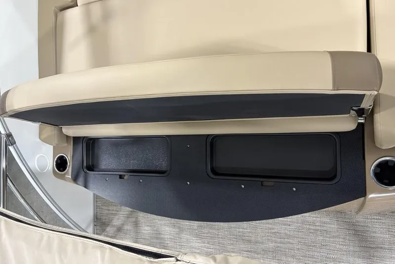 Slide: The Image of 2026 Godfrey Monaco 235 SFL boat seating with storage compartments and cup holders. - 23