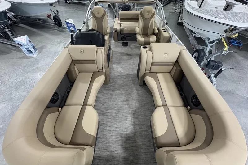 Slide: The Image of 2026 Godfrey Monaco 235 SFL pontoon boat with luxurious beige seating and modern design. - 27