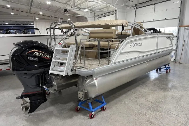 Slide: The Image of 2026 Godfrey Monaco 235 SFL pontoon boat with Yamaha engine in showroom. - 29