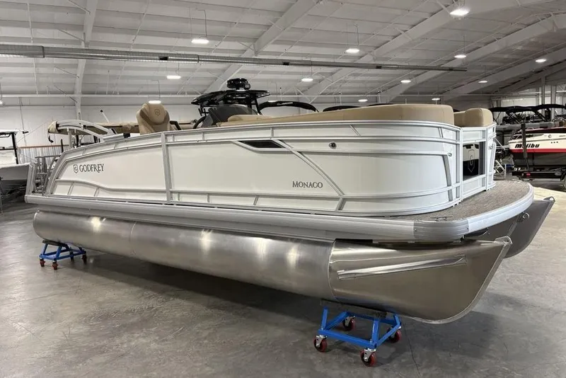 Slide: The Image of 2026 Godfrey Monaco 235 SFL pontoon boat in showroom, side view. - 30