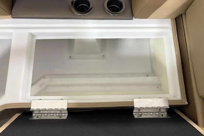 Slide: The Image of Storage compartment in 2026 Godfrey Monaco 235 SFL boat with cup holders and hinges. - 4