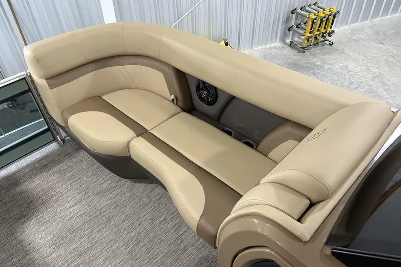 Slide: The Image of Luxurious seating on 2026 Godfrey Monaco 235 SFL boat, featuring beige upholstery and modern design. - 6
