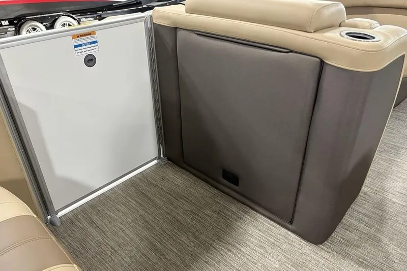 Slide: The Image of Interior of 2026 Godfrey Monaco 235 SFL boat, featuring seating and storage area. - 8