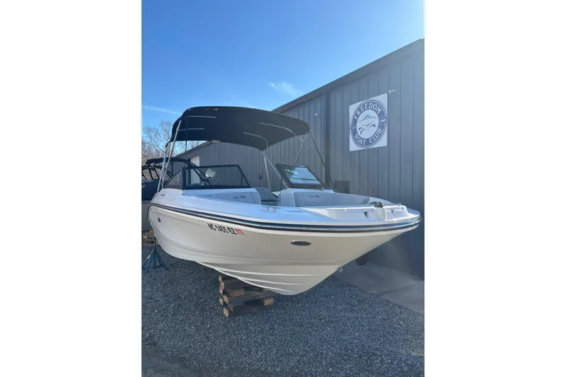 Slide: The Image of 2023 Searay SPX 210 OB boat at Freedom Boat Club, sunny day. - 1