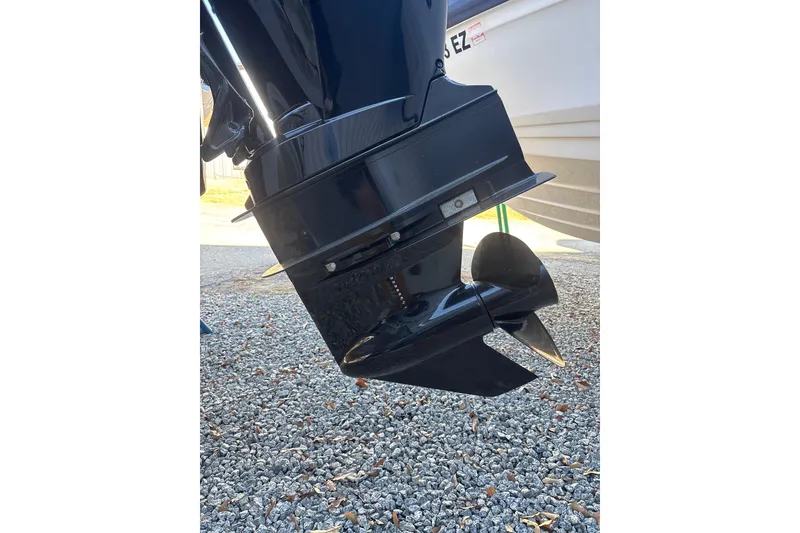 Slide: The Image of 2023 Searay SPX 210 OB outboard motor on gravel surface. - 28