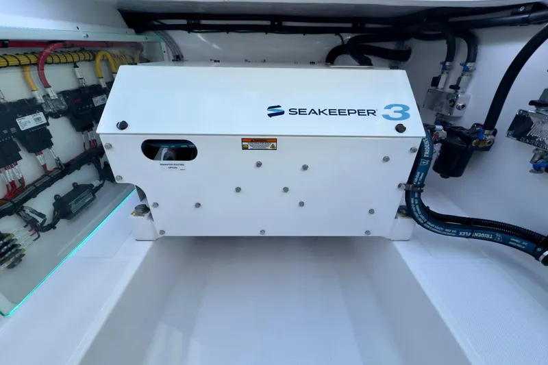 Slide: The Image of Seakeeper 3 gyroscope in 2026 Mag Bay 38 CC boat's engine room. - 9