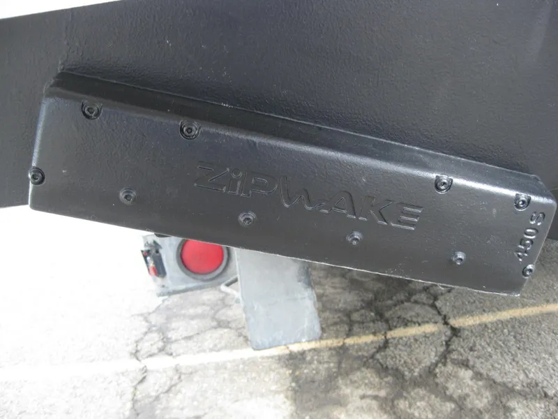 Slide: The Image of Close-up of a 2024 Nimbus T9 boat with Zipwake trim system. - 10