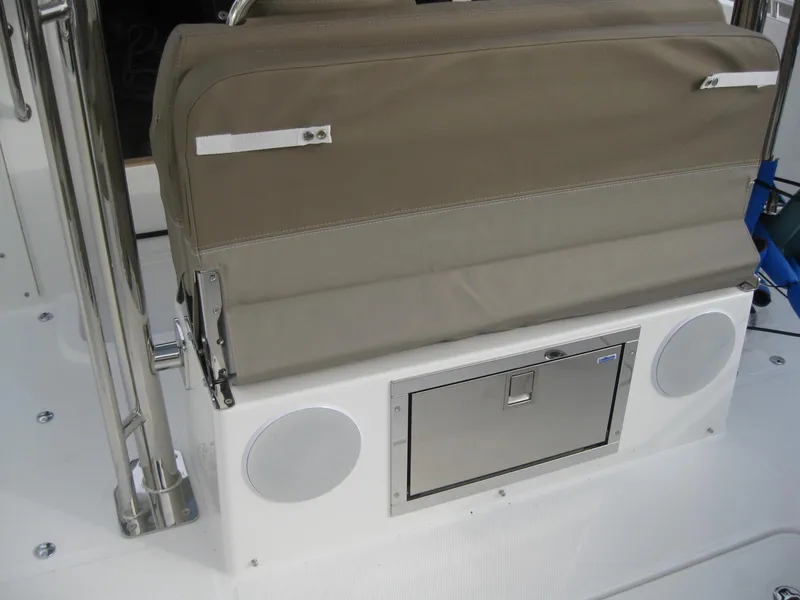 Slide: The Image of Nimbus T9 2024 boat seat with storage compartment and speakers. - 16