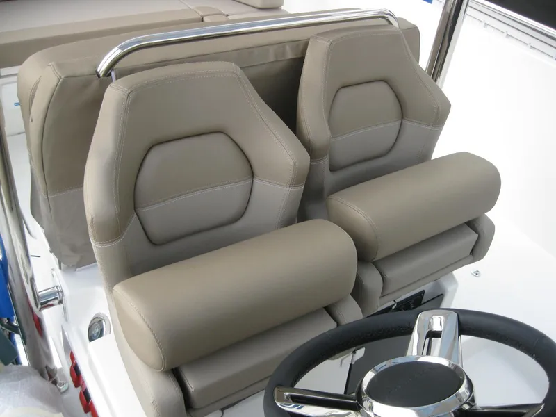Slide: The Image of 2024 Nimbus T9 boat seats and steering wheel. - 20