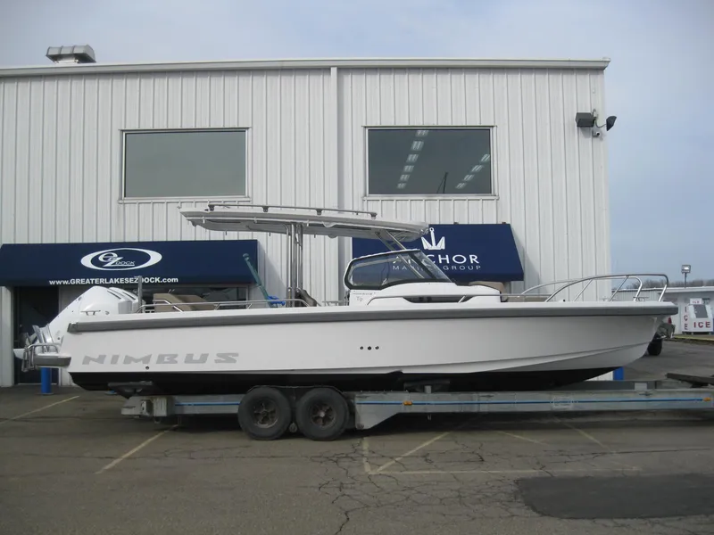 Slide: The Image of 2024 Nimbus T9 boat on a trailer outside a dealership. - 4