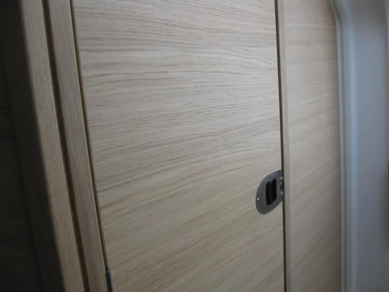 Slide: The Image of Wooden door with metal handle inside Nimbus T9, 2024 model. - 33