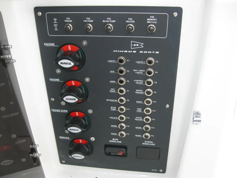 Slide: The Image of Control panel of 2024 Nimbus T9 boat with various switches and knobs. - 36
