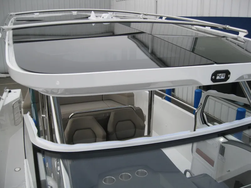 Slide: The Image of 2024 Nimbus T9 boat with sleek design and modern seating. - 42