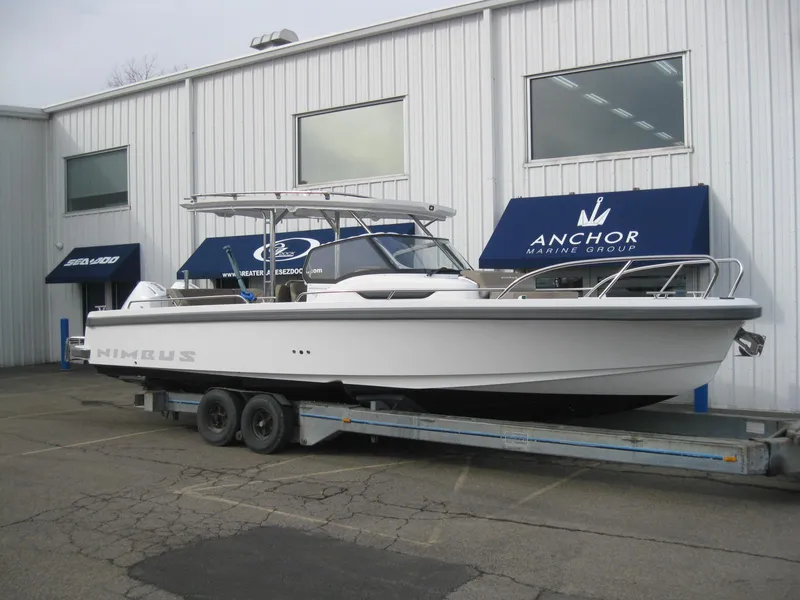 Slide: The Image of Nimbus T9 2024 boat on trailer outside Anchor Marine Group. - 5