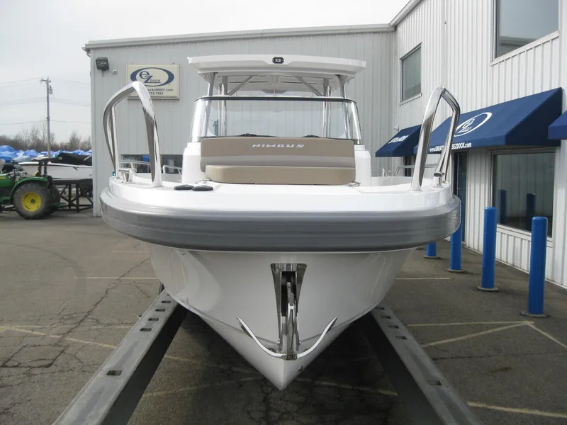 Slide: The Image of 2024 Nimbus T9 boat on trailer at dealership. - 7