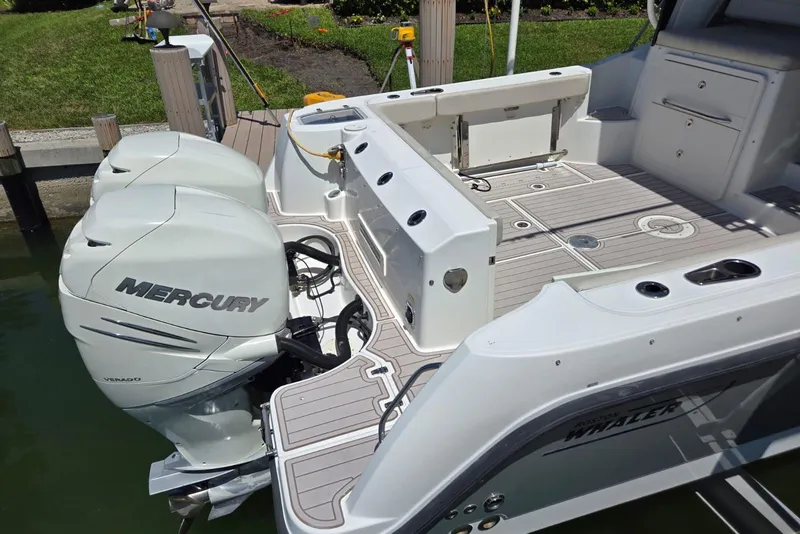 Slide: The Image of Boston Whaler 315 Conquest 2016 with Mercury engines at dock. - 15