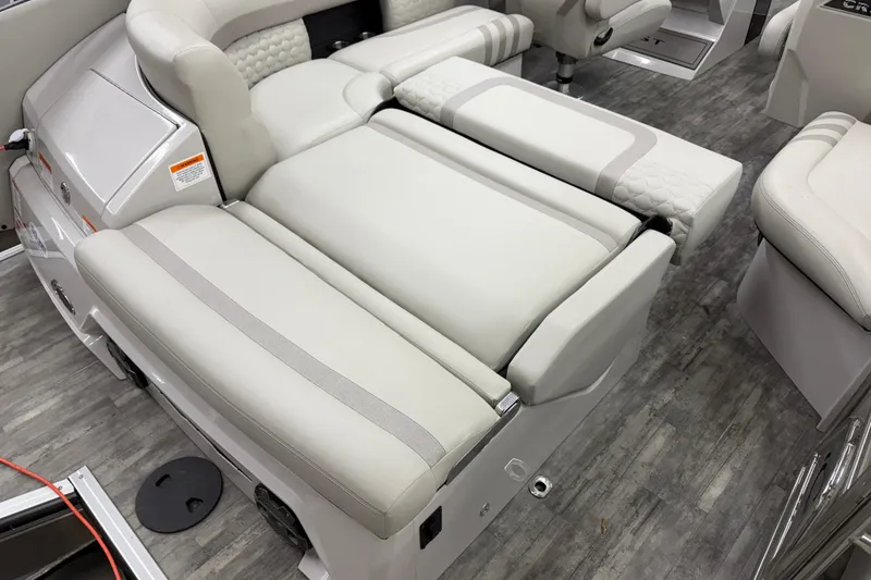 Slide: The Image of 2022 Crest Continental 250 SLS boat interior with luxurious seating and modern design. - 27